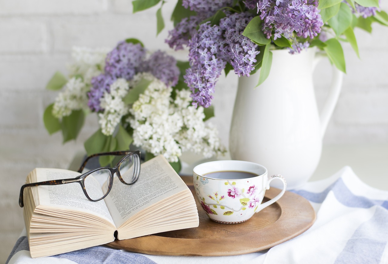 reading glasses on top of book